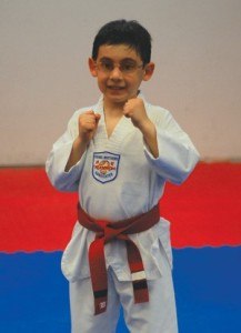 Mason Cole, 8, struggled in sports until he discovered tae kwon do. Now he is working on his black belt.