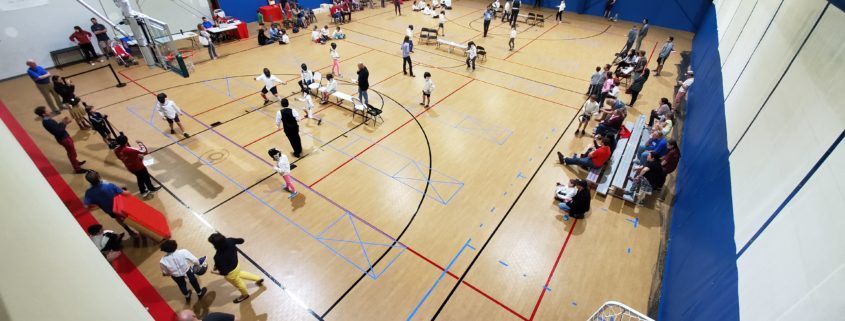 Y12/Y14 event, at the back of the gym, and Y10 event, middle and front, as seen from above.